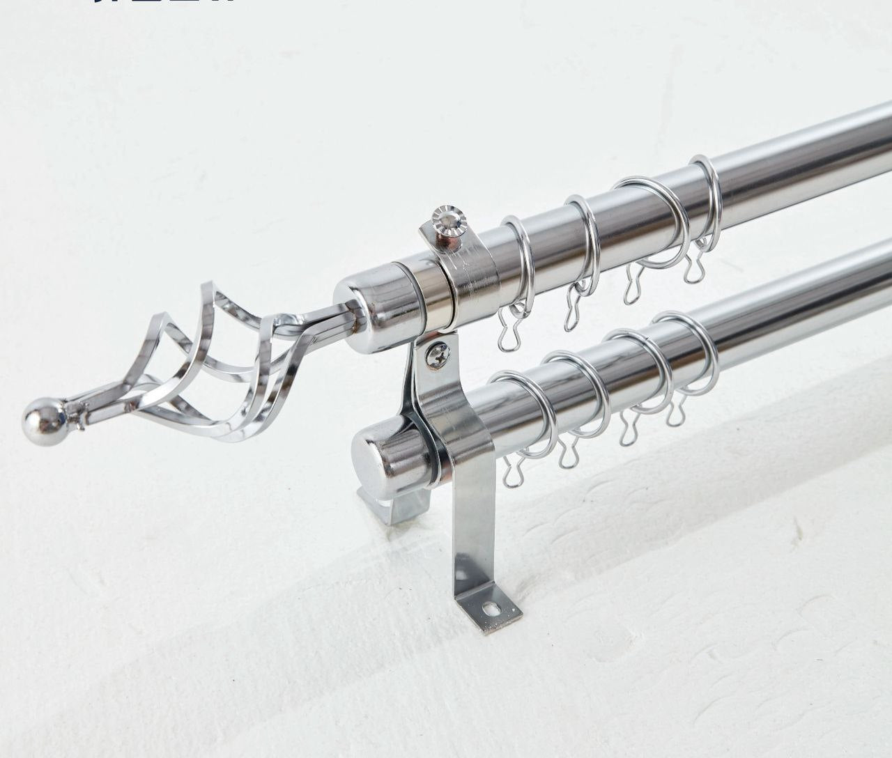 Fer de rideau double