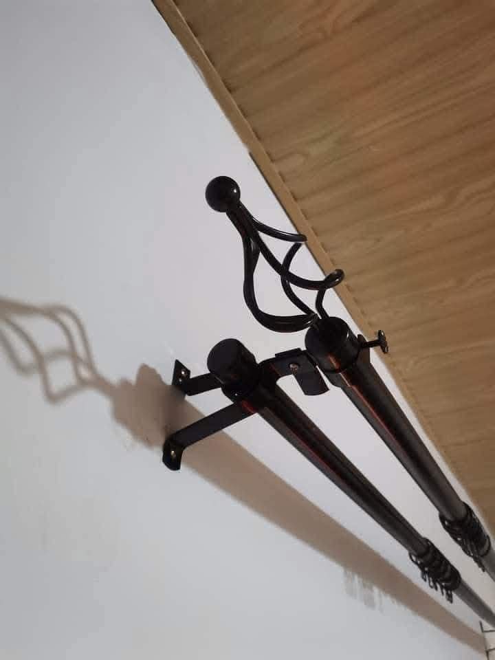 Fer de rideau double